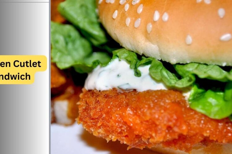 Crispy chicken cutlet sandwich with melted mozzarella, lettuce, tomato, and garlic aioli on toasted bread